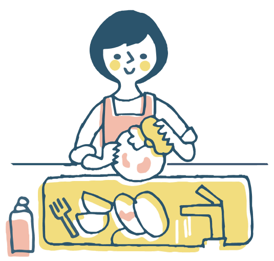 お皿洗いをする女性